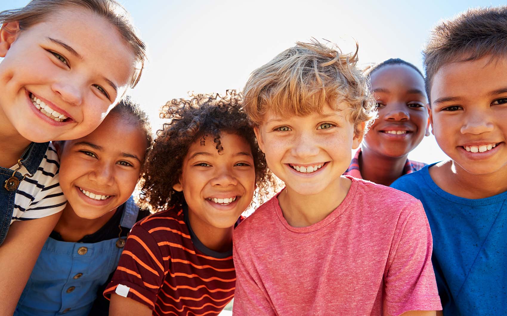 group photo of smiling kids